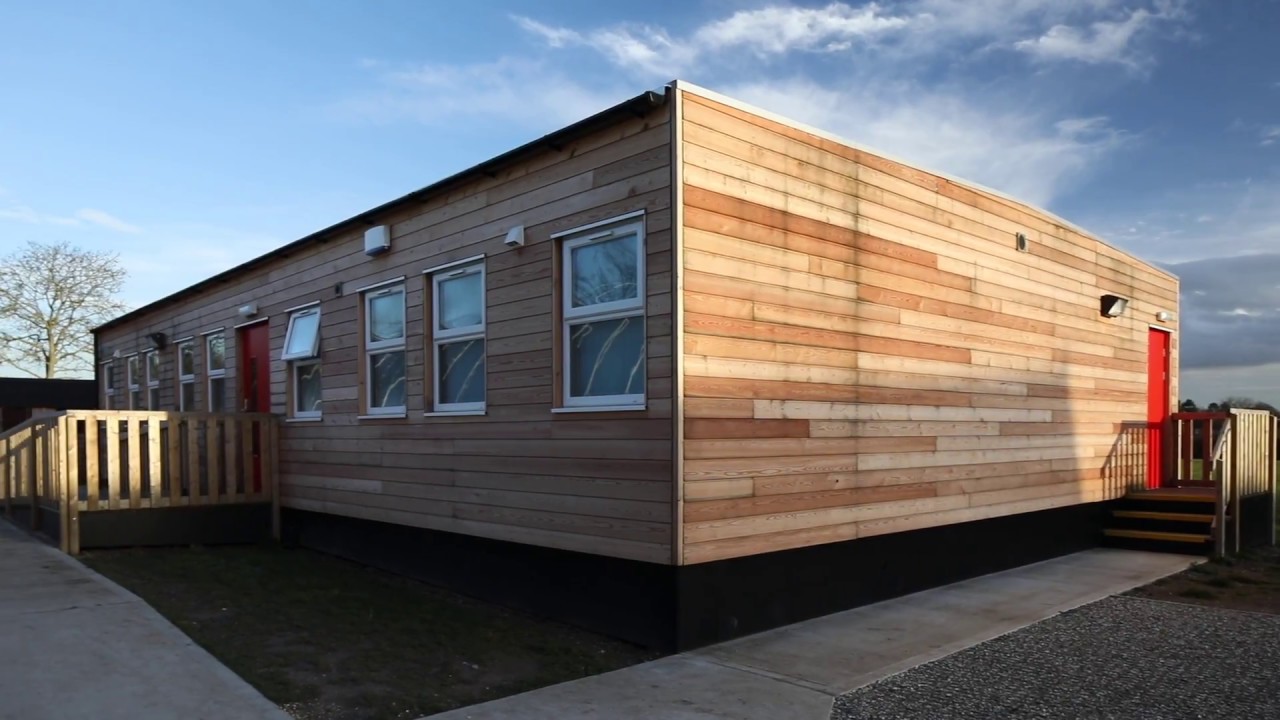 Elite Systems: Making a temporary classroom building blend in | Little Waltham Primary School