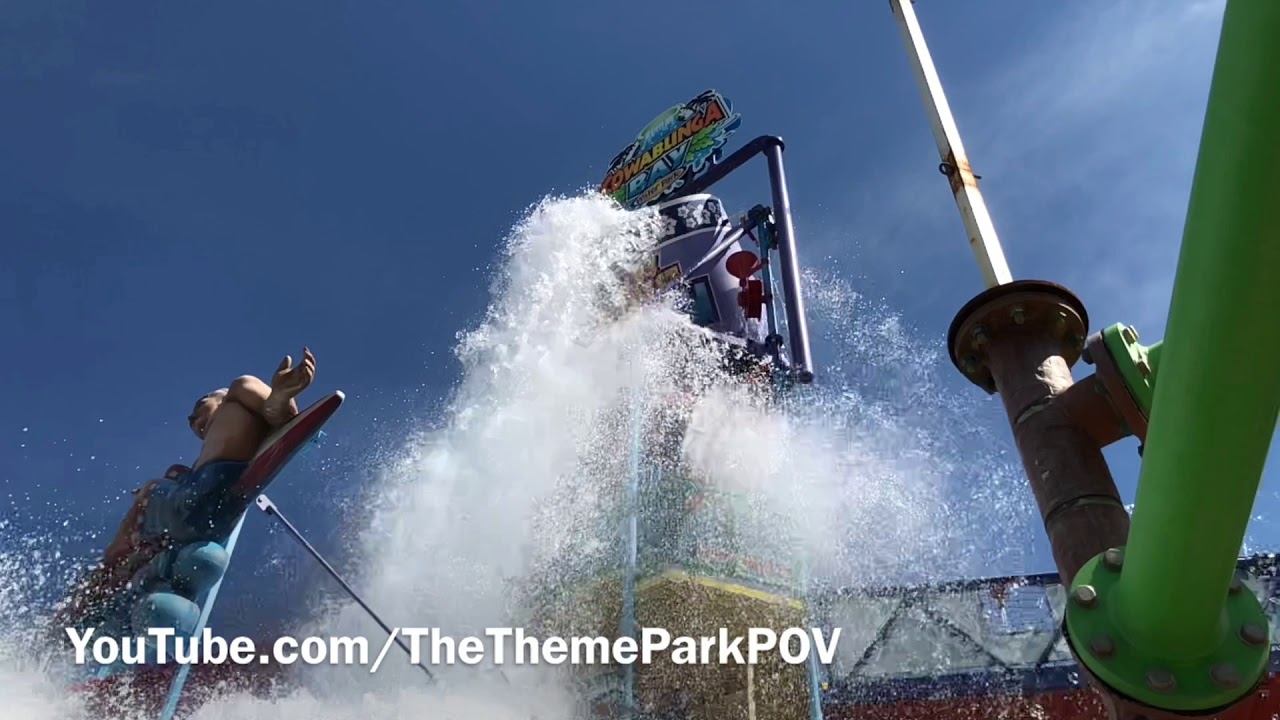Up Close Slow Motion Purple Giant Tipping Bucket - Part 1