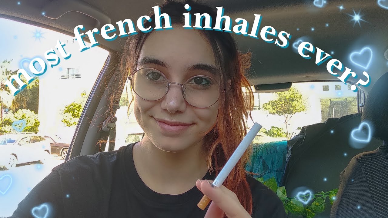 smoking a cigarette but I can only french inhale