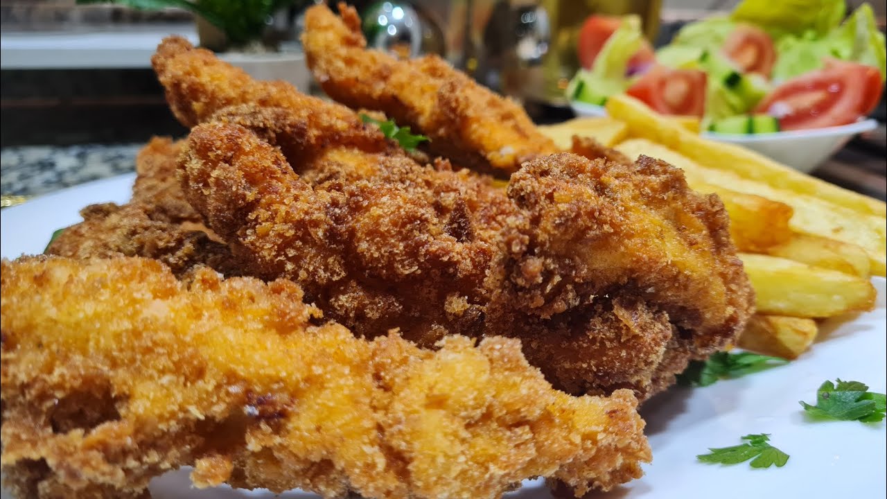 دجاج المقرمش او poulet kfc/ على طريقة المحلات(بزاف بنين ومقرمش) وصفة لي منبدلهاش ....