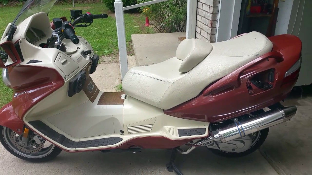 My custom burgman 650 w/dual pipes!
