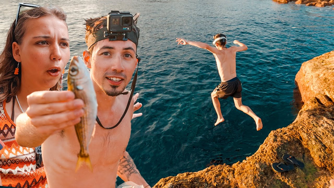 Jovem português salta ao mar e apanha peixe com as mãos