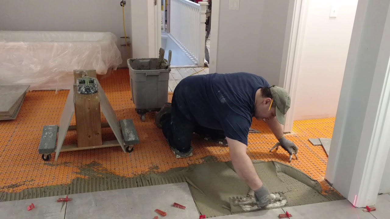 Back Buttering Very Large format tile.