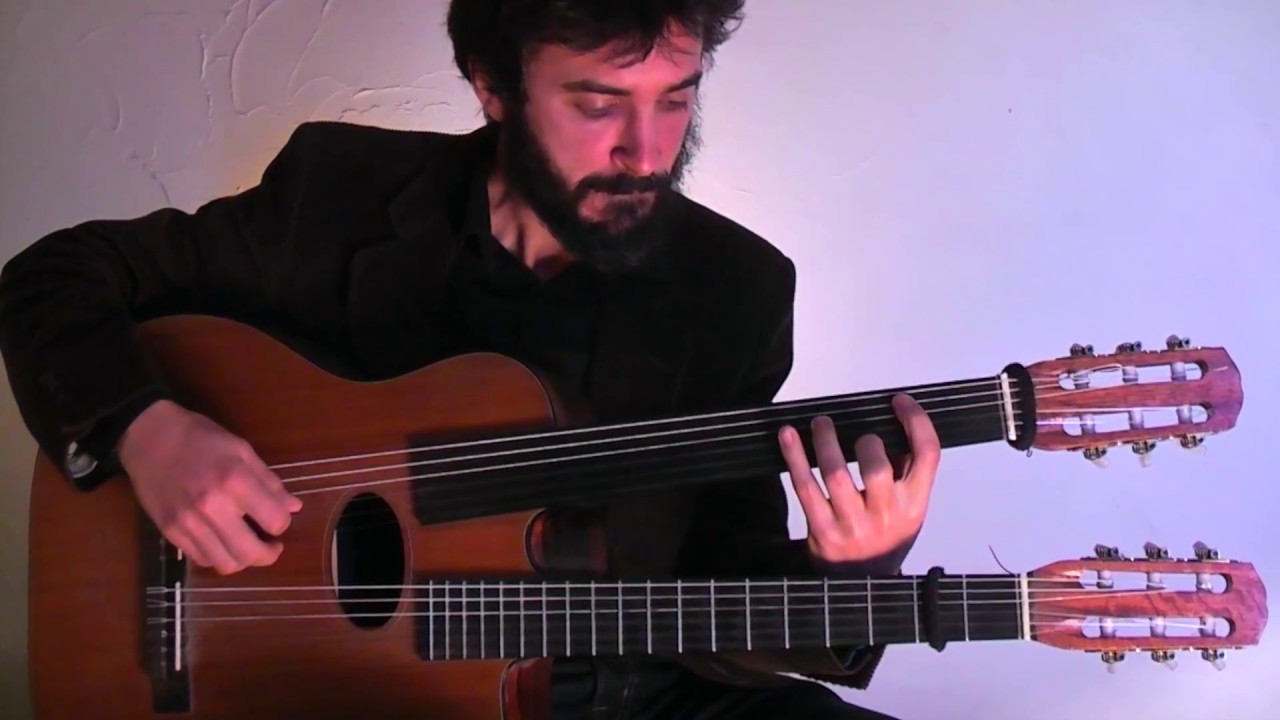 Acoustic Fretless Guitar and live looping - Tolga During