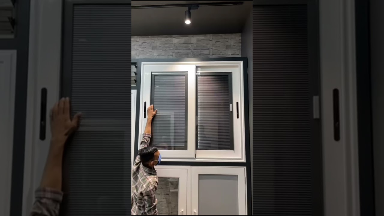 Integral Venetian Manual Blinds in Sliding Window