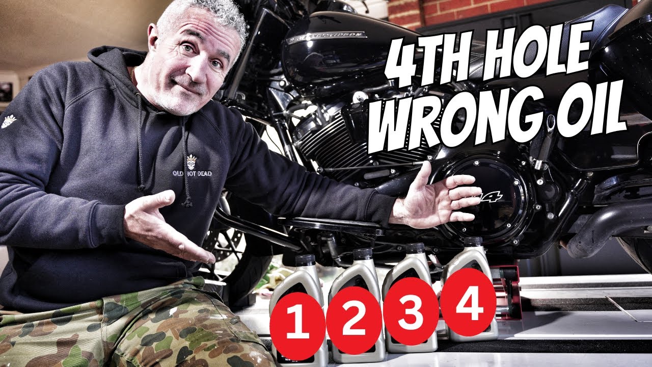 Замена масла в Harley Davidson через 4 отверстия.