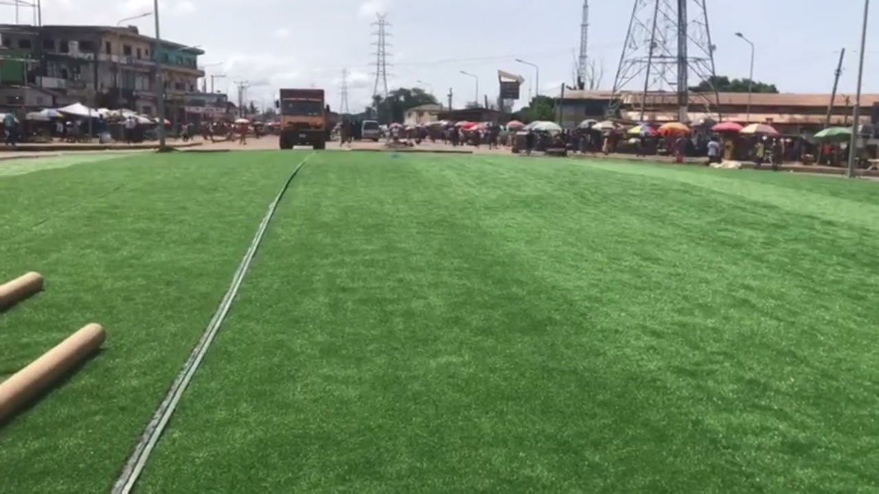 🚧ELWA Junction Roundabout Preparations | Laying Artificial Grass At Roundabout Center#monrovia
