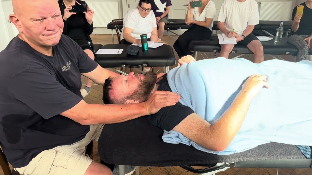Face and head massage. Brandon massaging Dave Taylor in London.