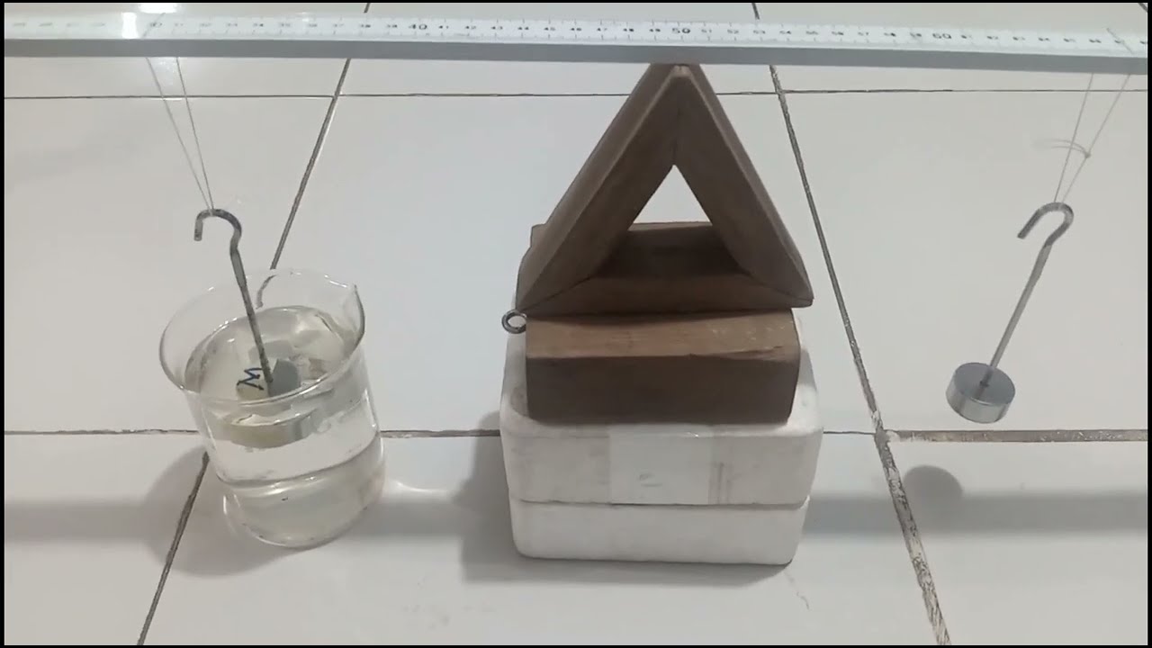 HOW TO DETERMINE THE RELATIVE DENSITY OF A SOLID USING THE PRINCIPLE OF MOMENTS