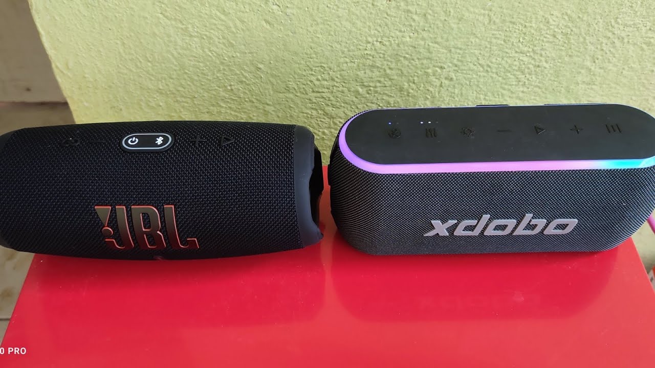Xdobo X8 III Vs JBL Charge 5, volumen al 100 %, usar audífonos, música NCS.