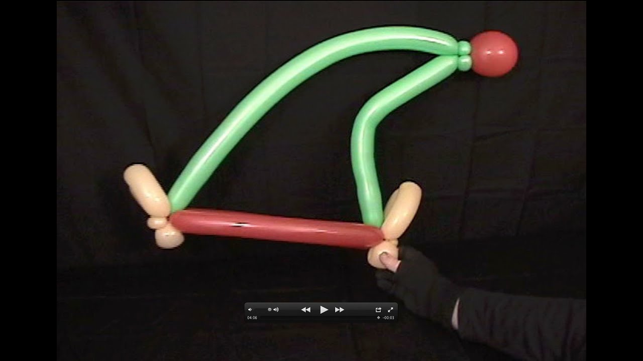 Learn how to make a balloon animal elf hat using balloon twisting