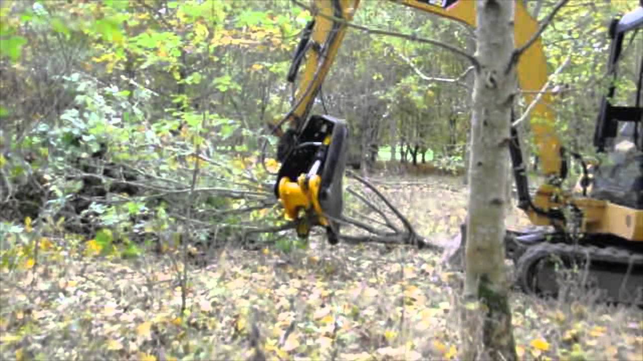 TMK lightened tree shear On a cat 302.5 www.ncd.equipment.com