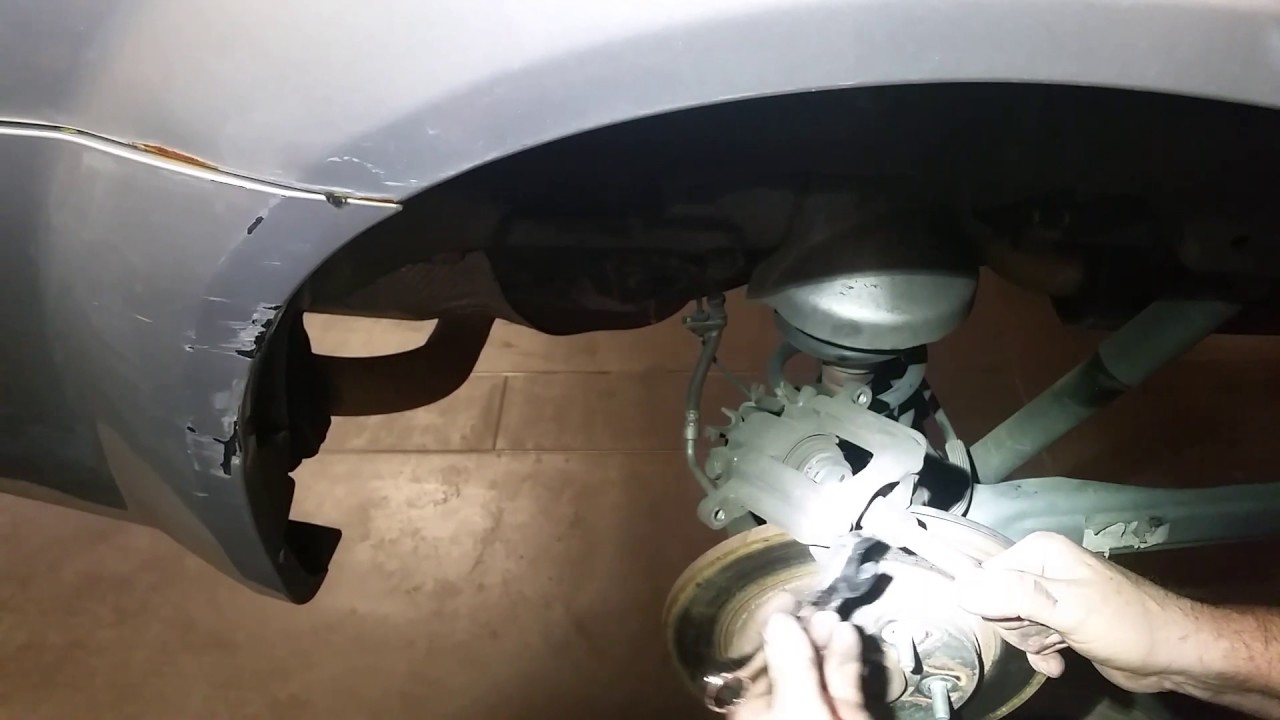 How to compress calipers with integrated parking brake (twist pistons)