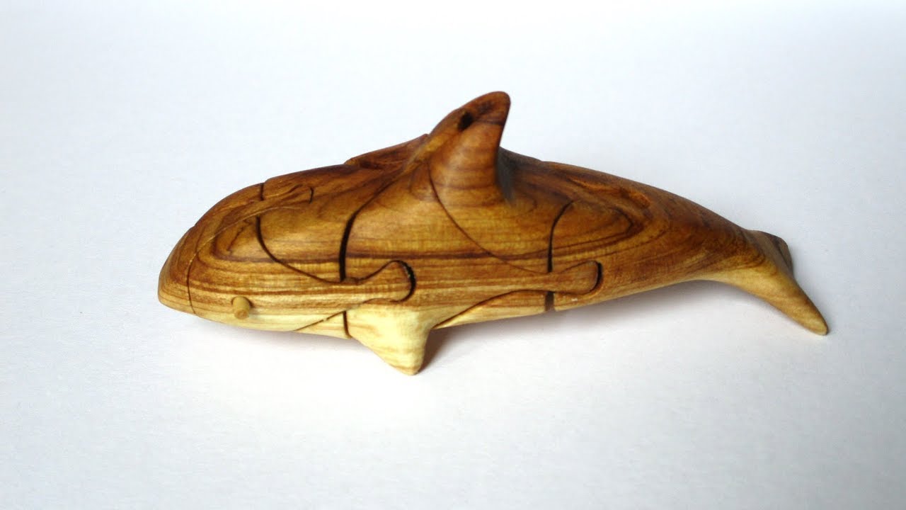 Killer whale. 3d puzzle on a scroll saw.
