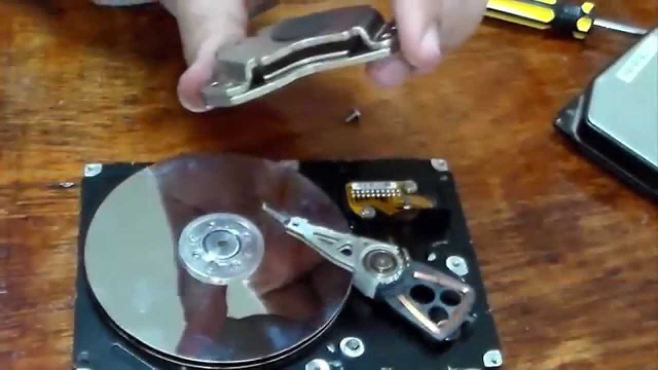 فك مكونات الهارد ديسك من الداخل و كيف يعمل How a Hard Drive works