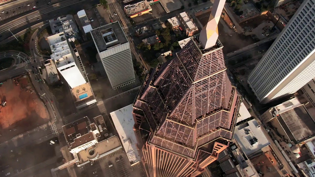 Drone capture#bird eye view city top#clouds moving