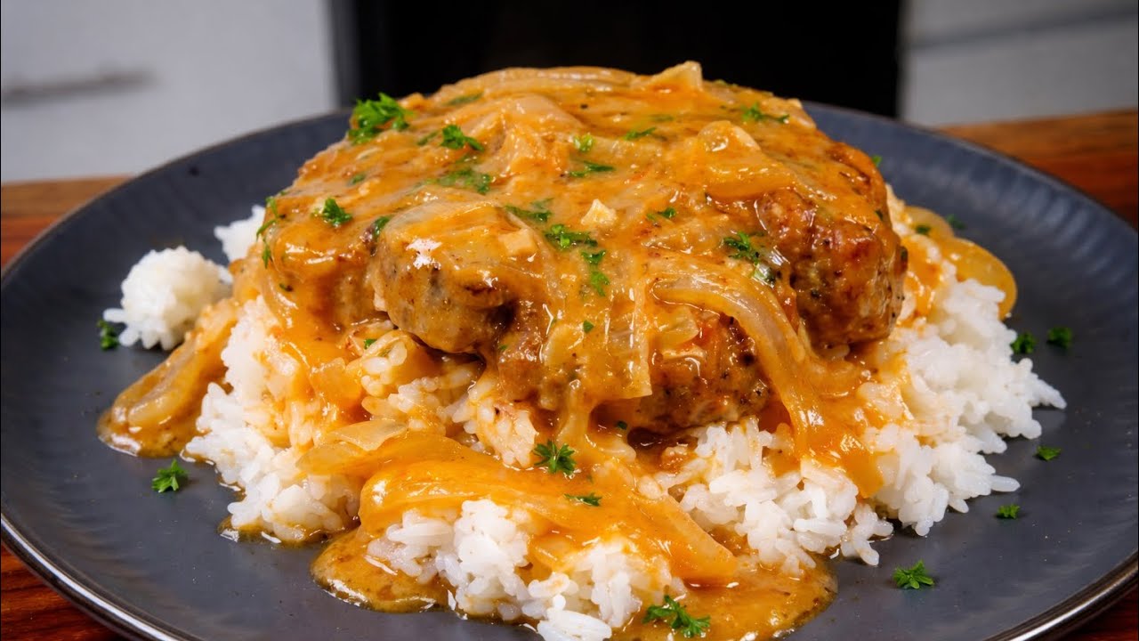 The JUICIEST Cajun Smothered Pork Chops Ever Made (Drowned in Onion Gravy!)