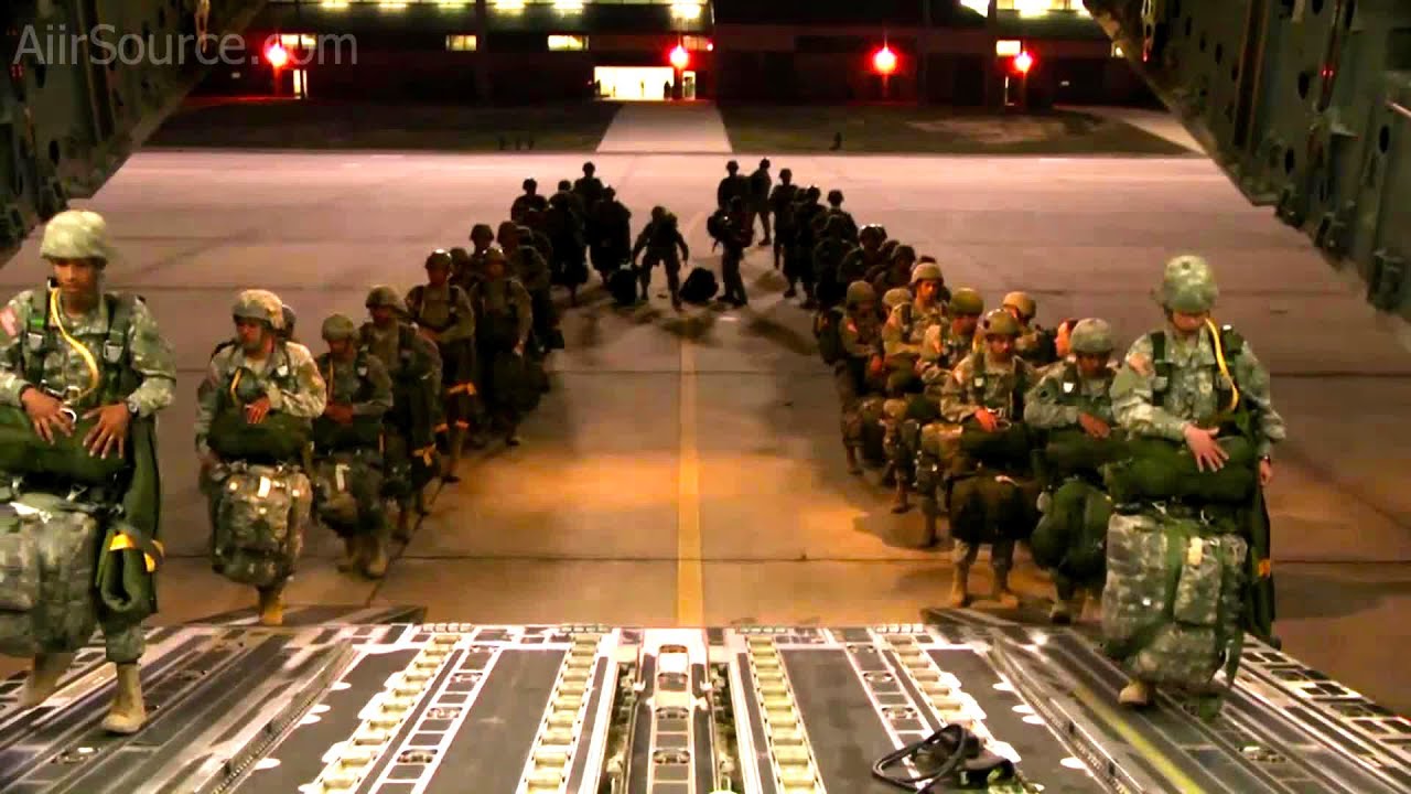 Airlift Squadron air-drop cargo and personnel from C-17A Globemaster III (Nightvision)