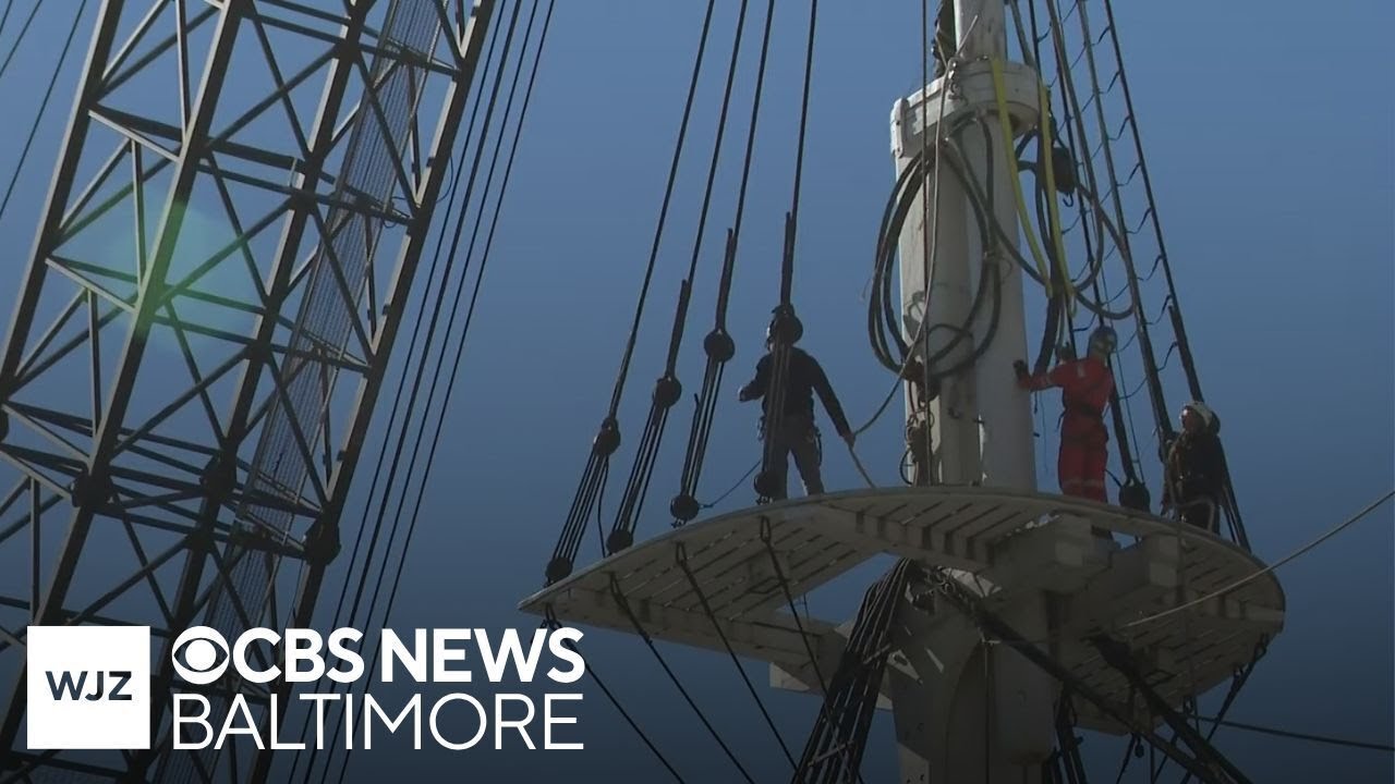 Masts of the USS Constellation being removed as part of restoration project