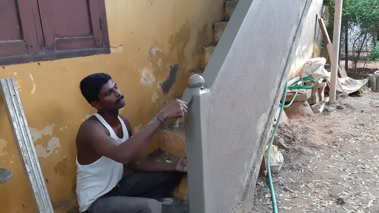 Stair hand wall plain plastering in old building-using by sand and cement construction