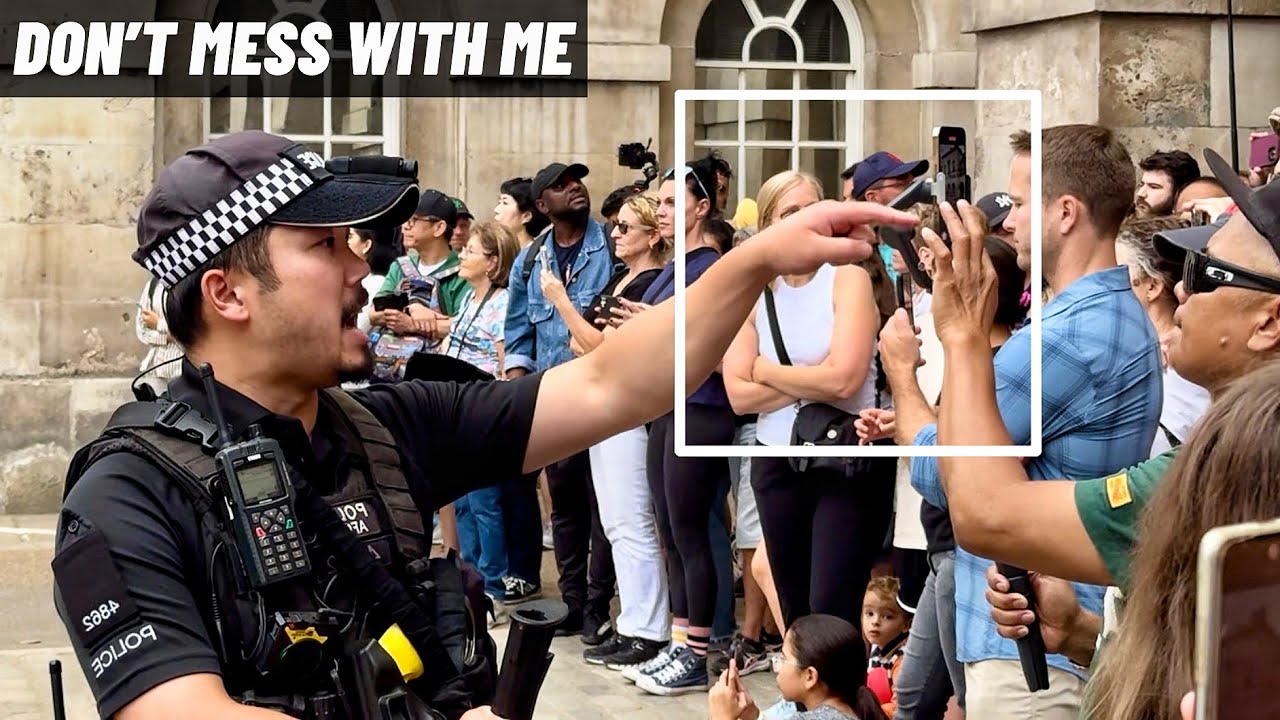 HORSE GUARDS INSTANTLY STOP AND SHOUT 'MOVE!' THREE TIMES AT TOURISTS FOR THEIR SAFETY!