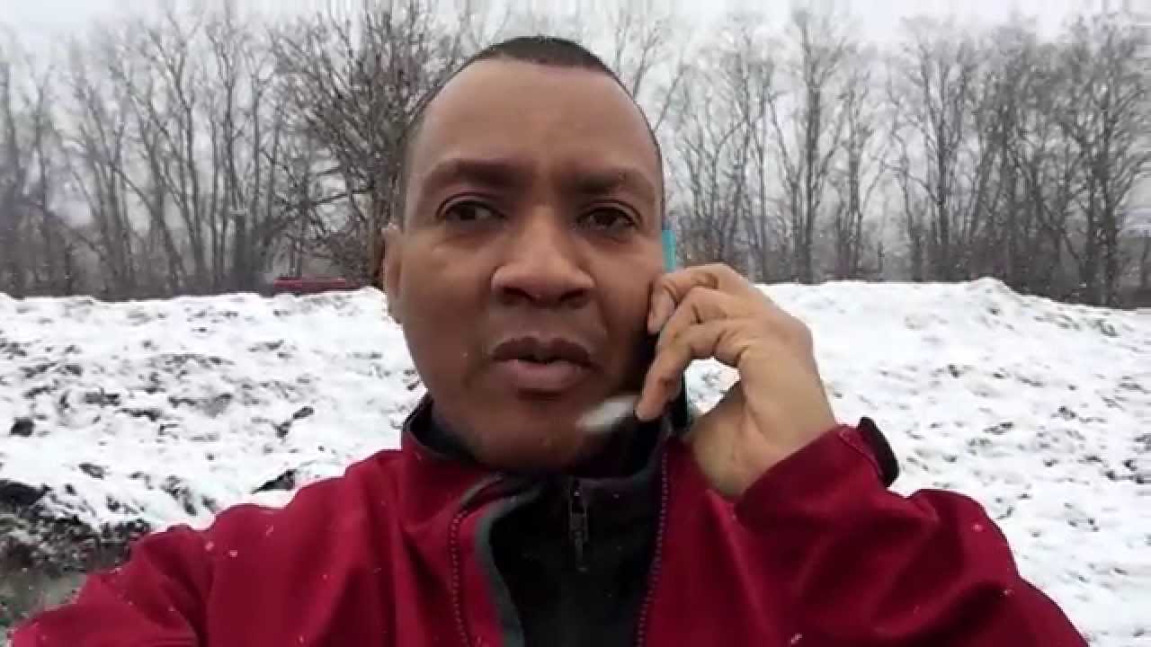 Haitian Man Calling the Governor to stop the snow...lol