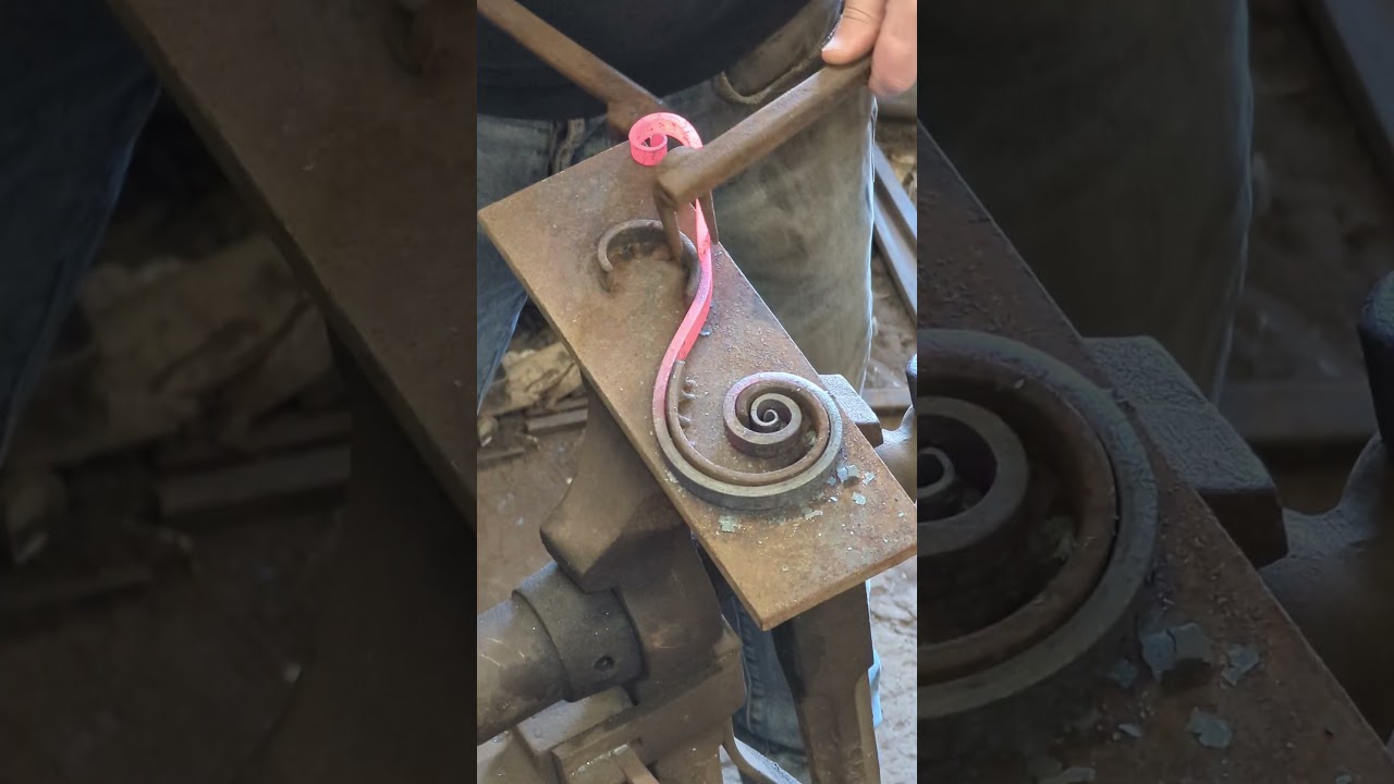 @TomFellBlacksmith scrolling up an S scroll with a jig. #blacksmith #makingvideos #asmr