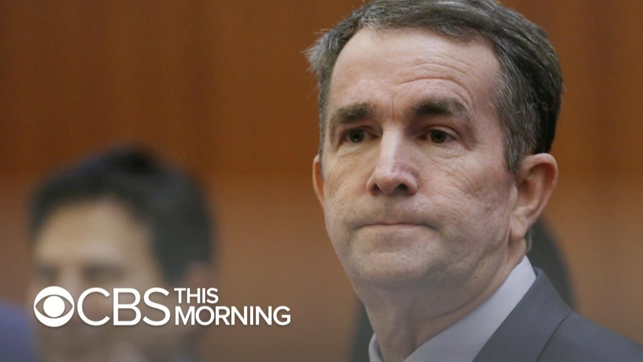 Amid controversy, Virginia governor's staff standing by him for now