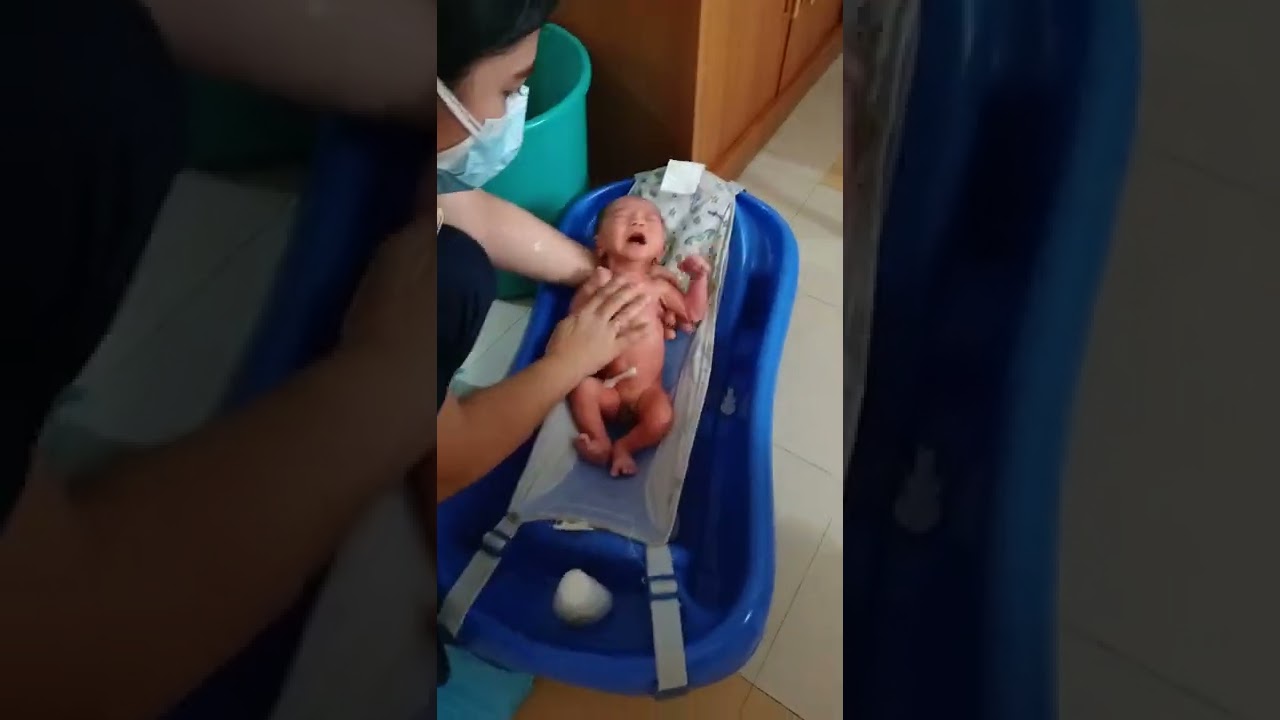 First baby bath. Crying hard. #shorts
