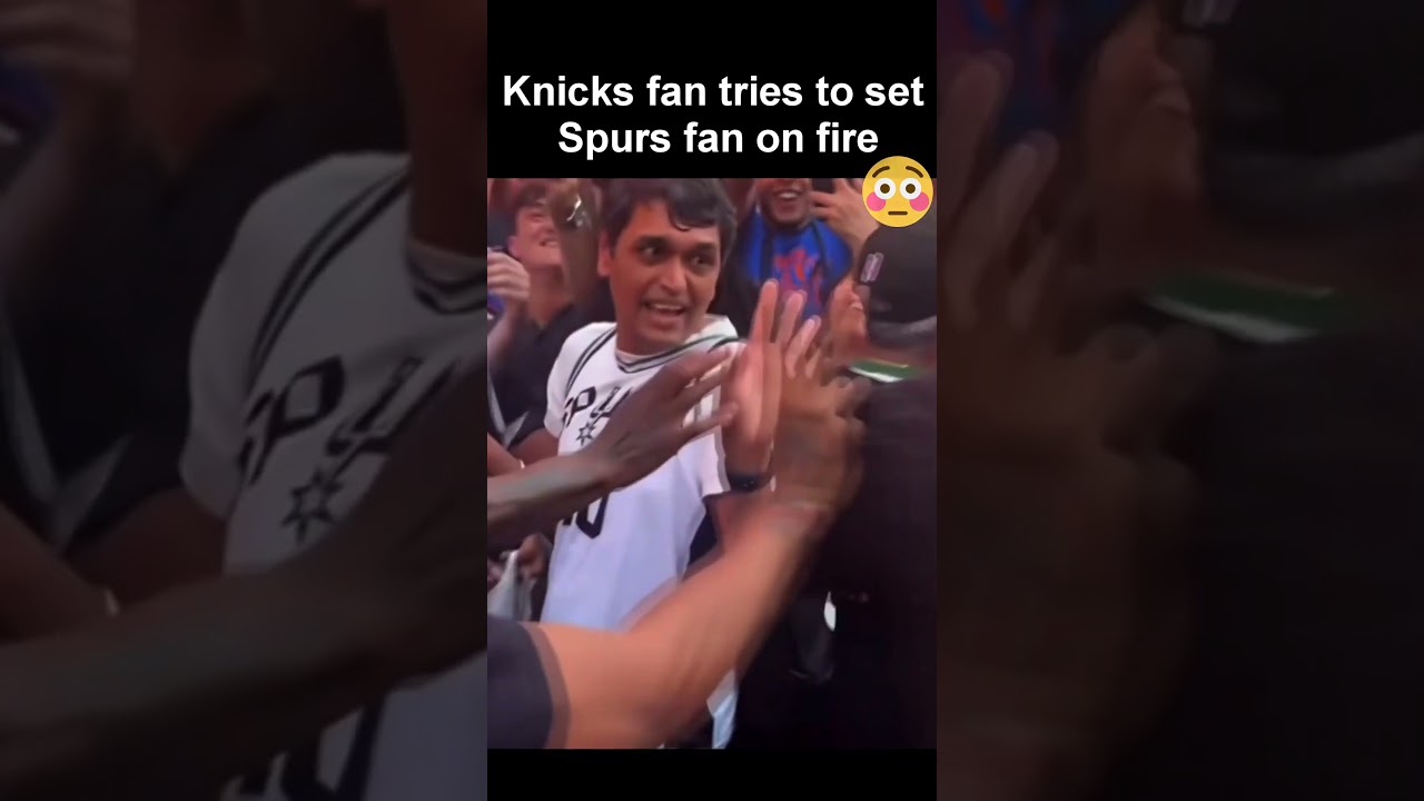 Spurs' fan hair almost get set on fire by knicks fan 😱