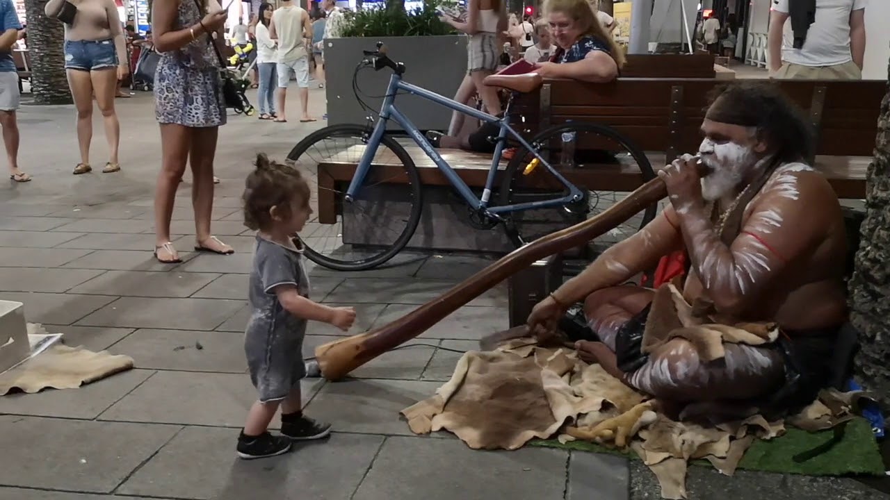 Little kid discovering didgeridoo - Gold Coast, Australia