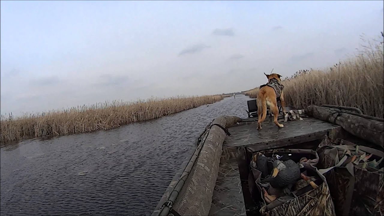18ft Excel F86 Boat with Mud Buddy through Ice