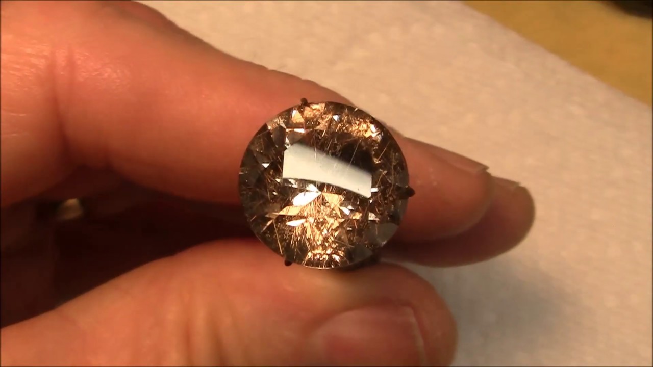 Faceting gemstones-  Rutilated quartz