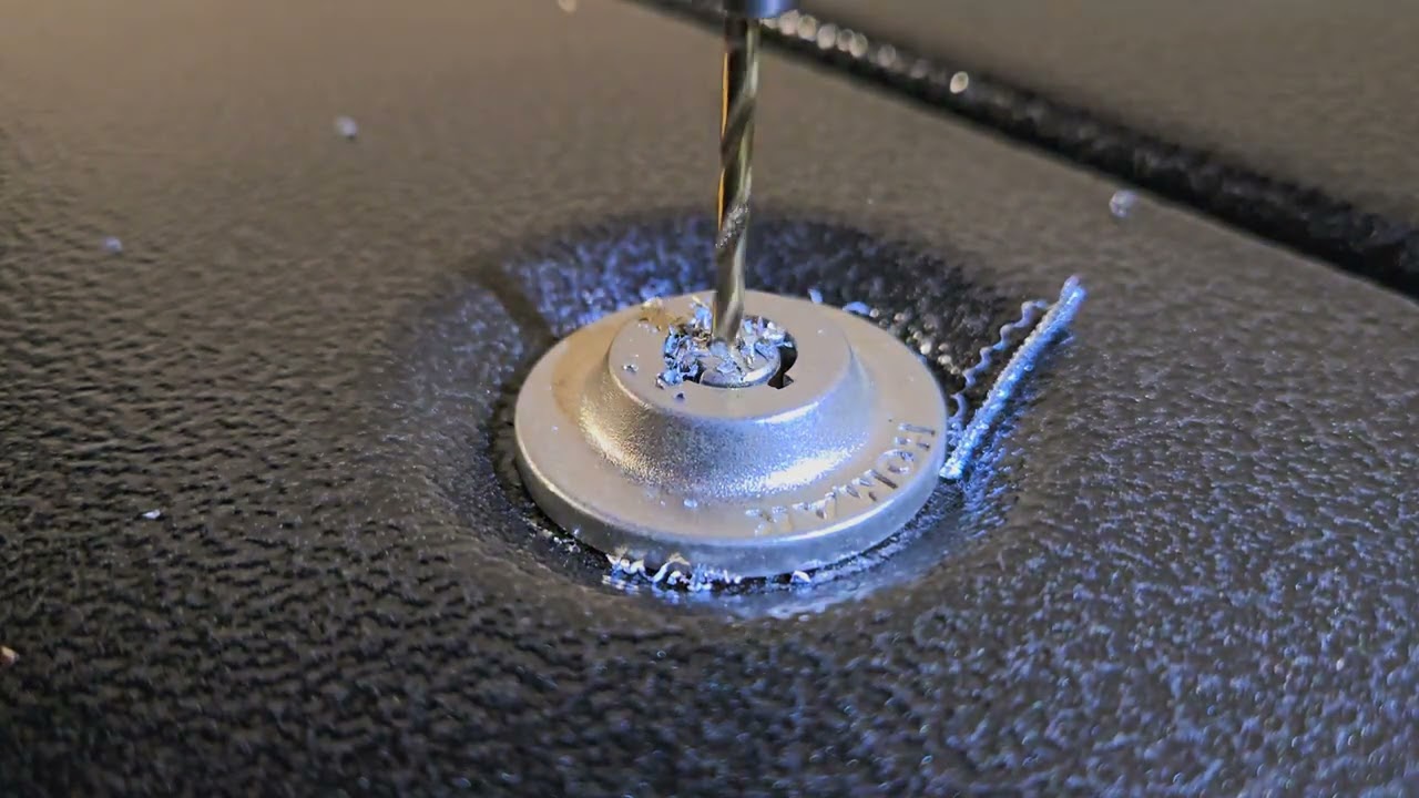 Drilling out a tubular safe lock