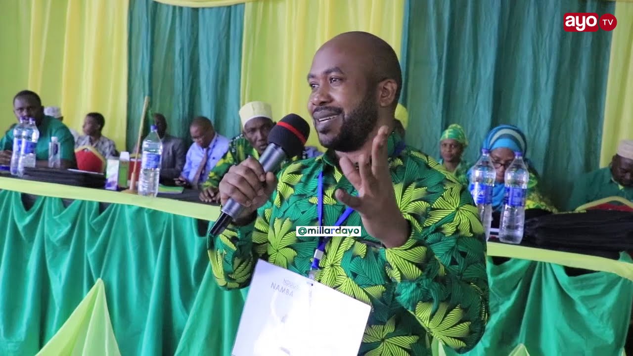 DR. MWAKA NA BARUANI  MUHUZA  WAKIJINADI MBELE YA WAJUMBE   KUOMBA KURA ZA  UBUNGE