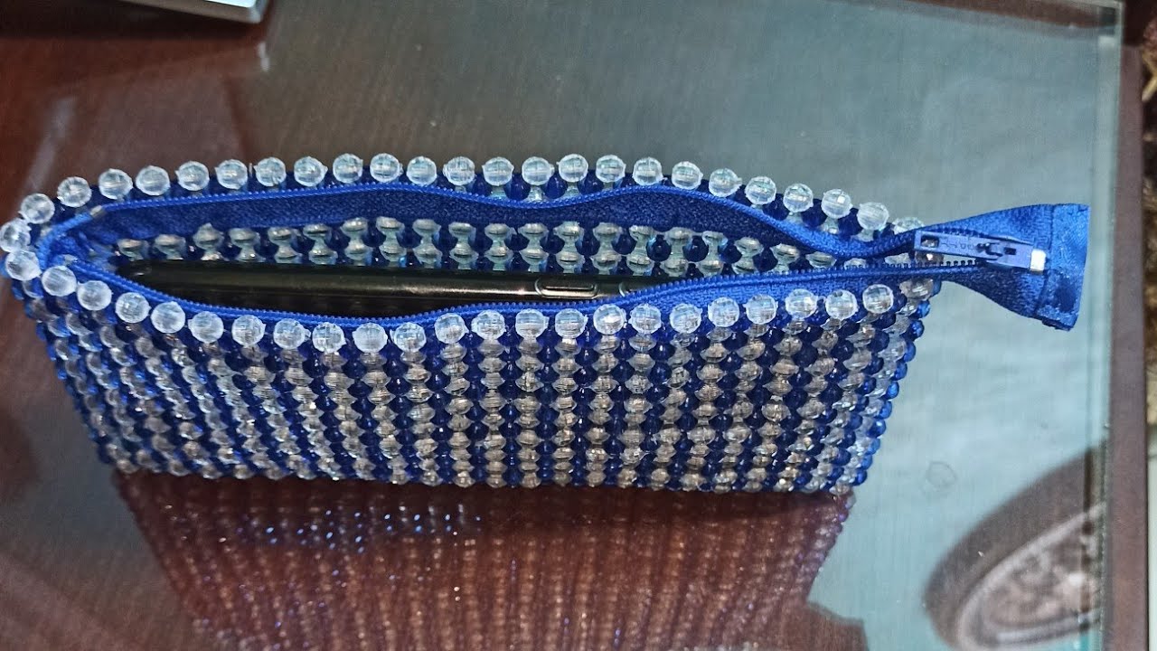 طريقة تركيب السوستة(السحاب) لمحفظة ( بورتفيه) او شنطة خرز How to install a zipper for a bag of beads