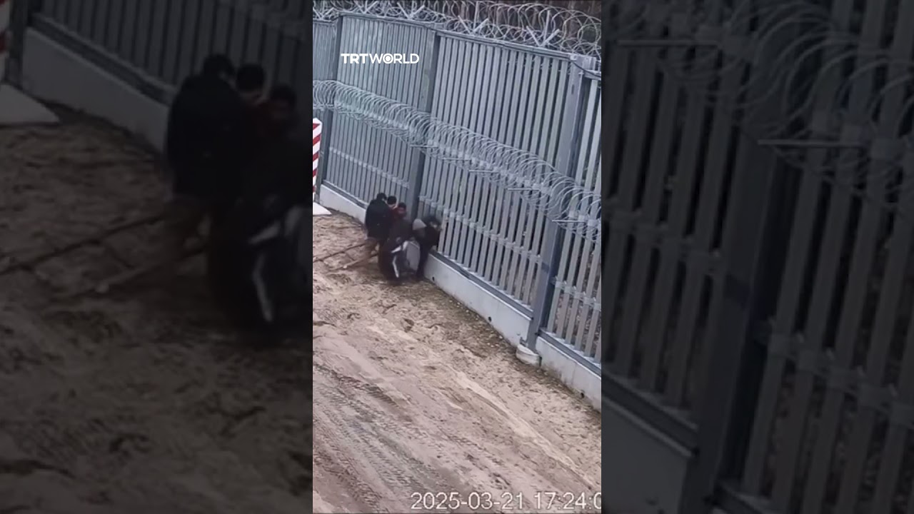 Polish border guards stop migrants cutting through barrier