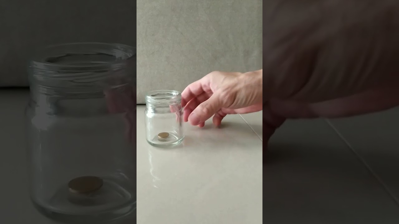 Bounce coin into glass