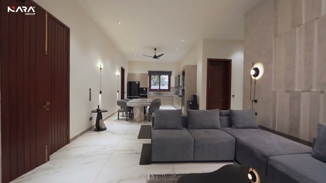 A 1000-yard luxury residence with 4 portions, private pool & lift by Nara Builders