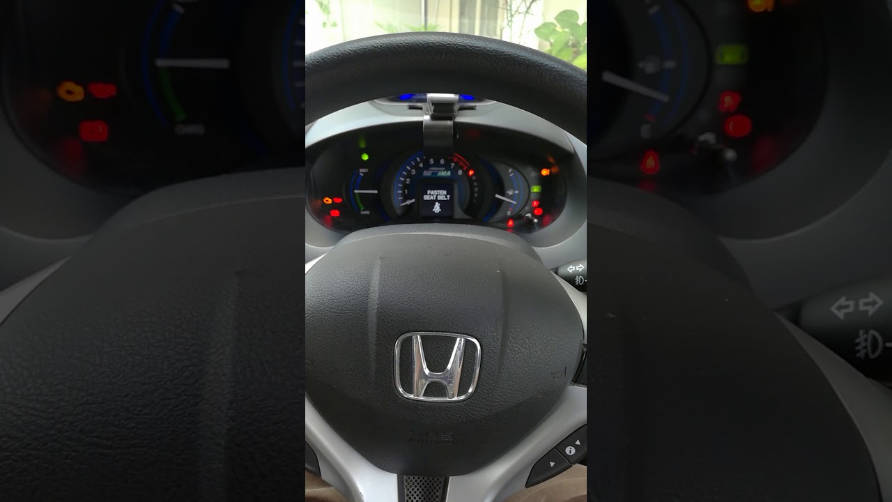 Honda insight 2012... console. Lights..up. normal