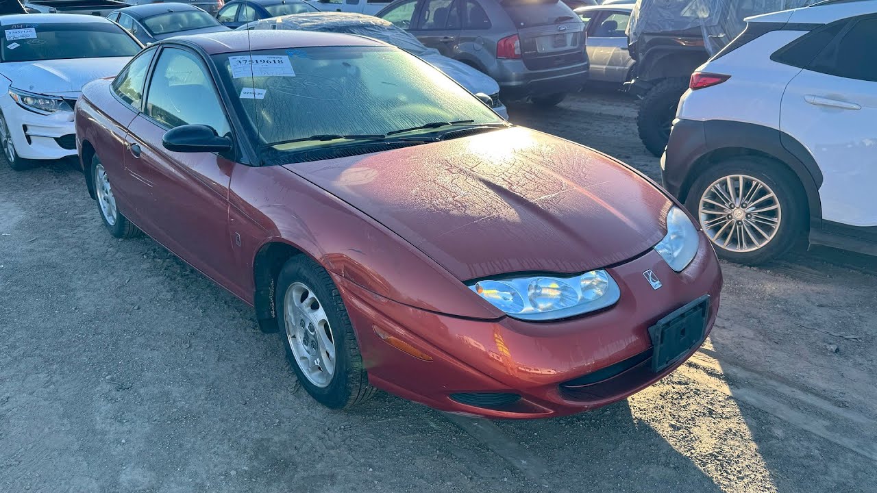 This 35K Mile Saturn SC1 is $125 at IAA!!! I've got to Have it!