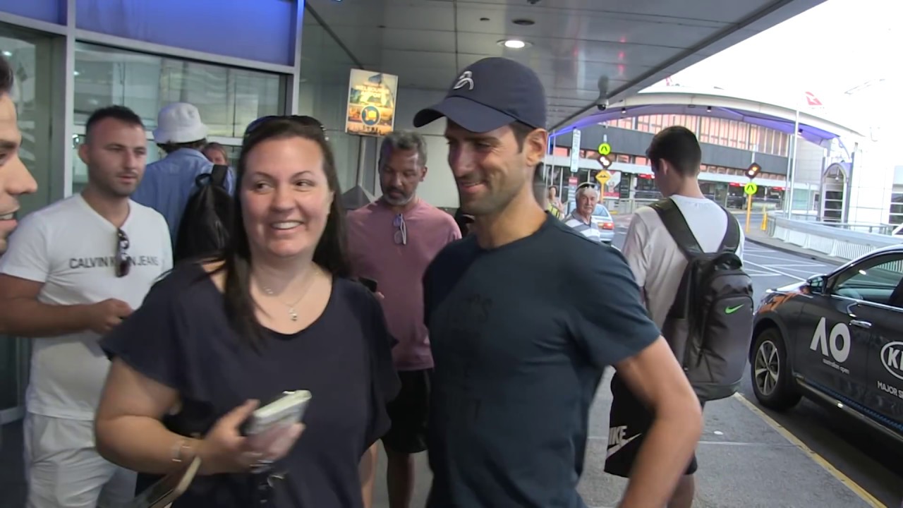 'Australian Open champion Novak Djokovic swamped by adoring fans at Melbourne Airport' 15MOF