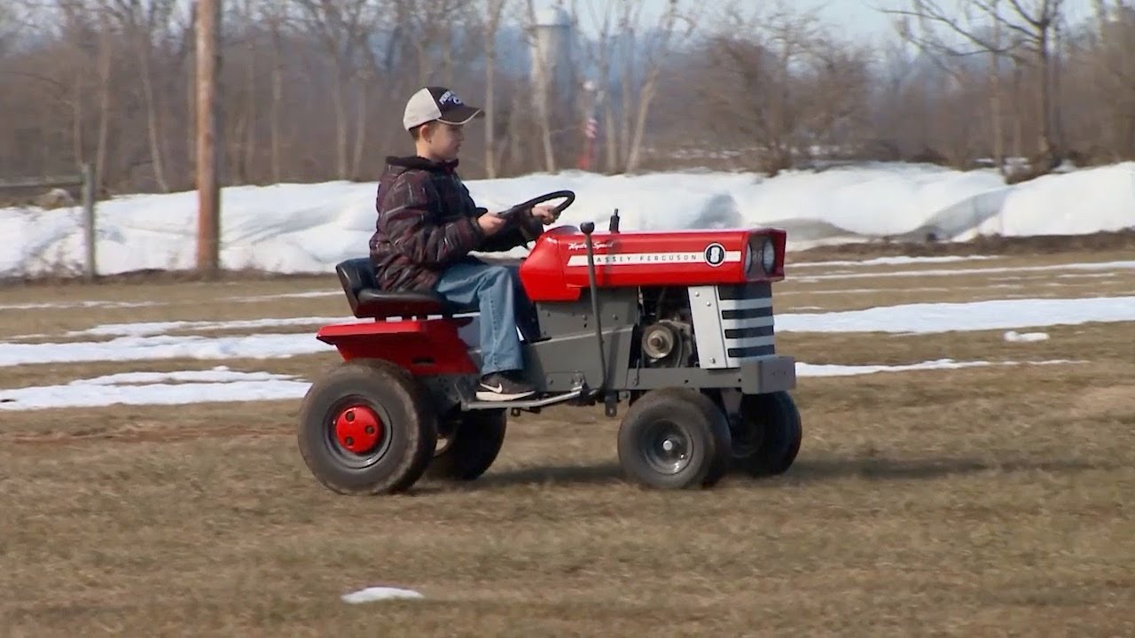 Father And Son Bond Over 1974 Massey Ferguson Model 8 Tractor