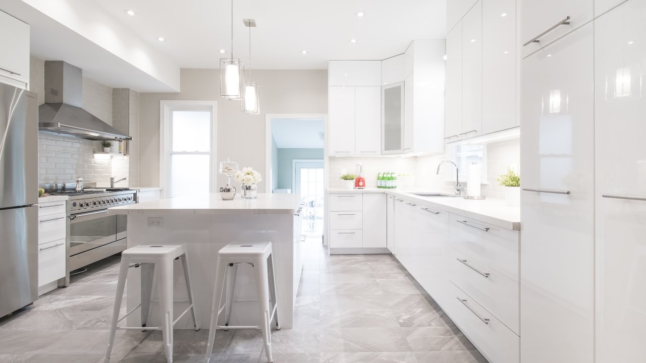 A dark, cramped kitchen gets a bright and white remodel