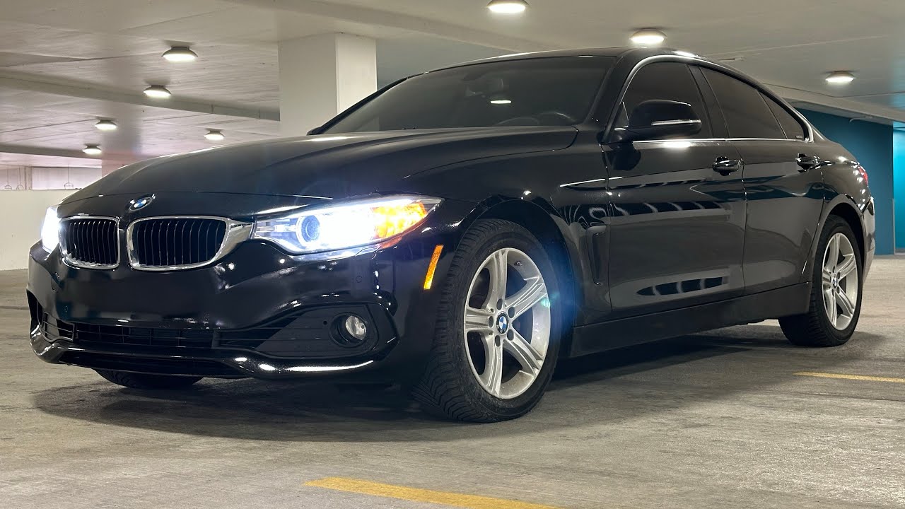 BMW 428i XDrive хэтчбек Grand Coupe 2015 года выпуска, пробег 110 000 миль, черный цвет.