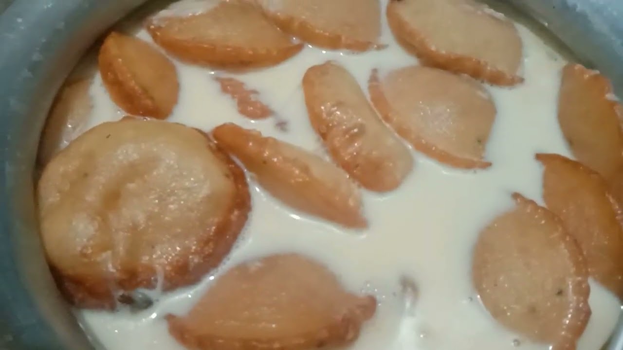 তেলের পিঠা দুধে ভেজানো রেসিপি