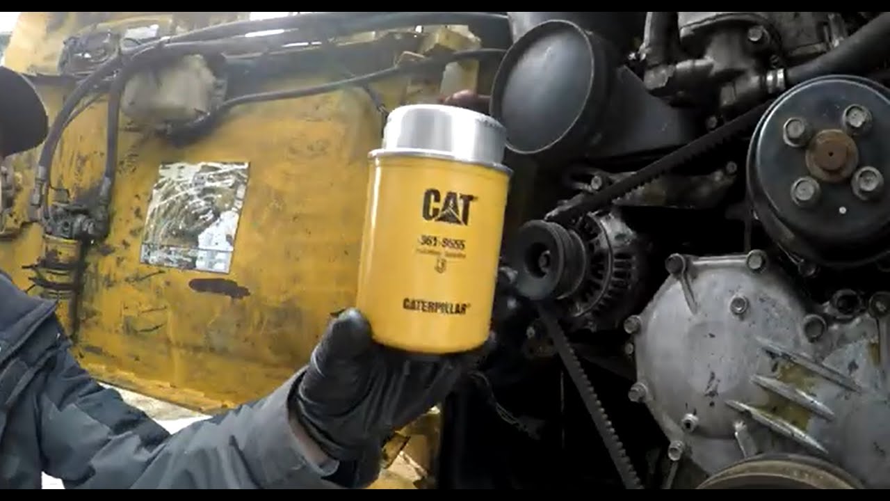 Changing fuel filter on caterpillar 246c skid steer