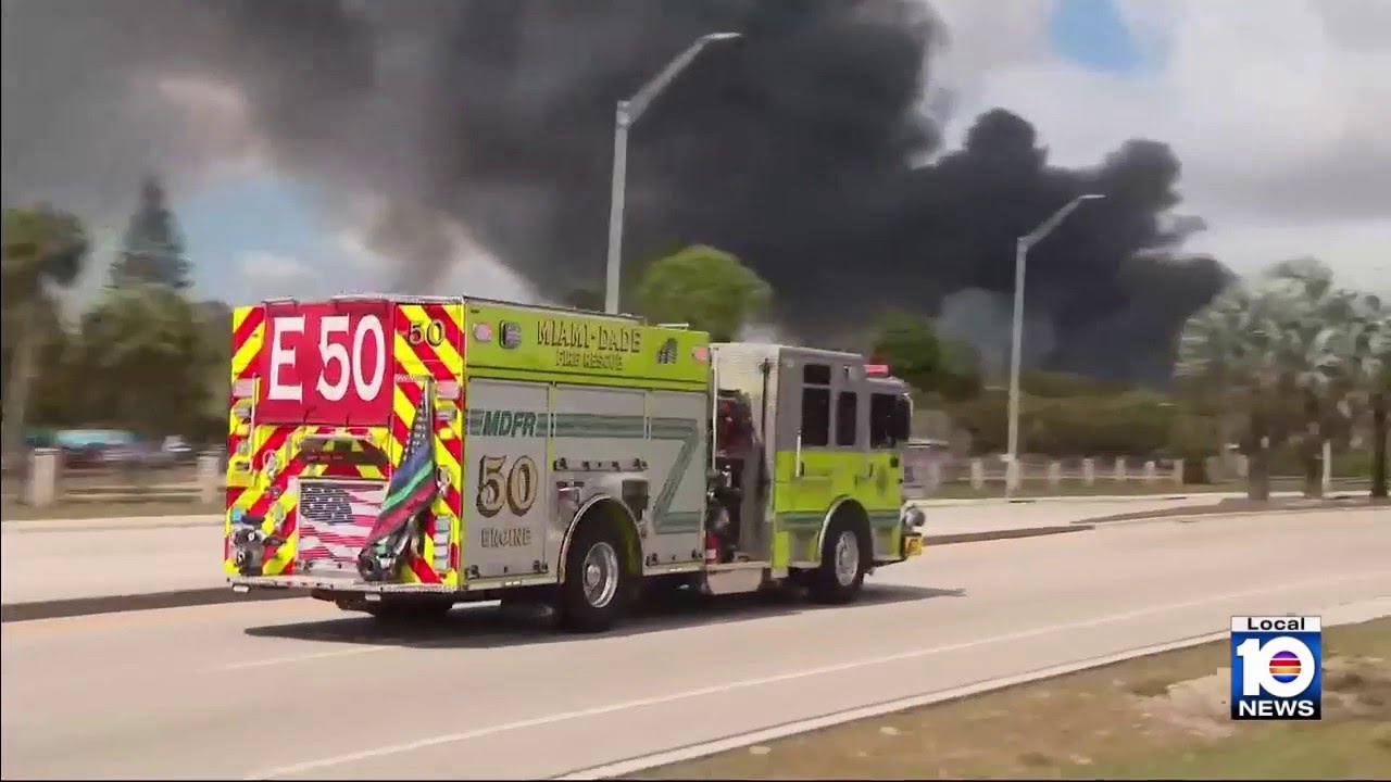 Firefighters continue to battle flames at NW Miami-Dade warehouse