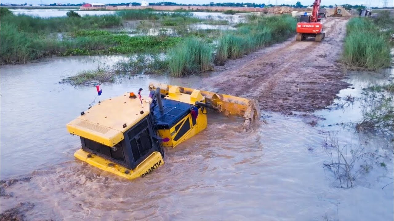 Shantui Dozer Clearing And Repair The Sink Road With Excavator 