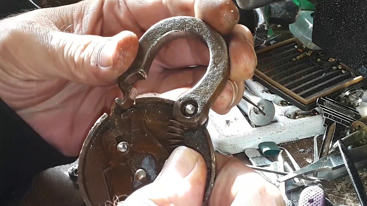 (550) Inside a 1913 Miller 6 Lever Padlock